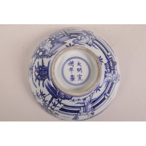 75 - A Chinese blue and white porcelain bowl decorated with figures in a garden, 6 character mark to base... 