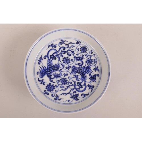 80 - A Chinese blue and white stem dish with scrolling lotus flower and phoenix decoration, 6 character m... 