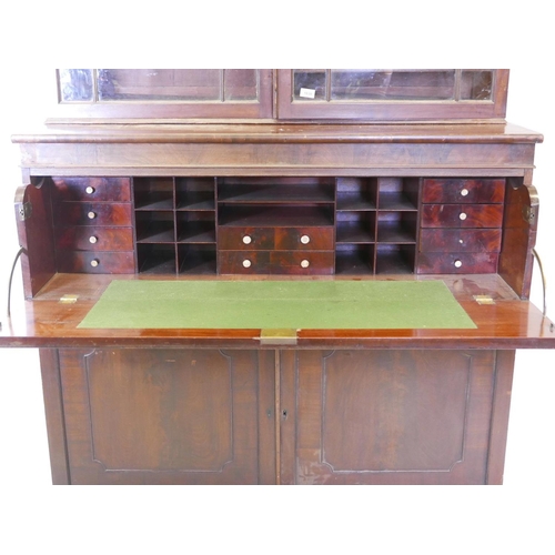 1105 - A C19th mahogany secretaire bookcase in the style of Gillow, with astragal glazed top over a fitted ... 