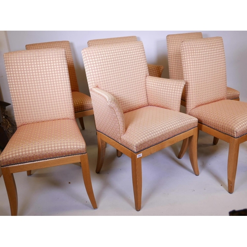 1132 - A set of six (four and two) oak framed John Lewis dining chairs, raised on sabre supports, in good c... 