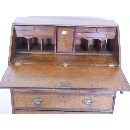 1125 - A C19th Chinese elm marriage cabinet, fitted with drawers, 41