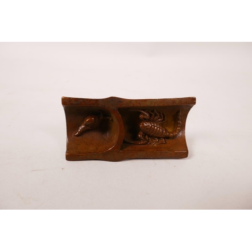 258 - A Chinese ebonised carved and pierced wood incense holder, cased, 8½