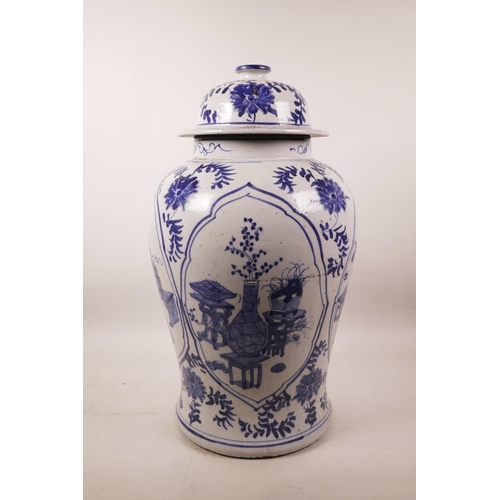 328 - A Chinese blue and white pottery pear shaped vase of octagonal form decorated with warriors on horse... 