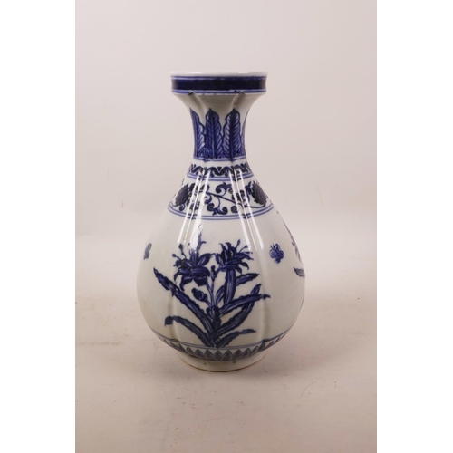 350 - A pair of Chinese blue and white porcelain footed bowls with floral decoration, 3½