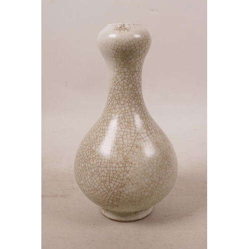 400 - A Chinese Jun kiln glazed pottery vase with a slender neck, 13