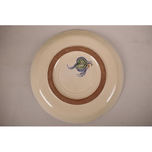 510 - A Chinese blue and white porcelain bowl with polychrome decorative panels depicting birds amongst fl... 