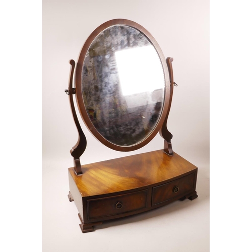 1092 - A Regency style mahogany swing toilet mirror, 17