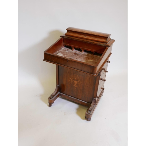 1099 - A Victorian inlaid figured walnut davenport, with four true and four false drawers, A/F, 21