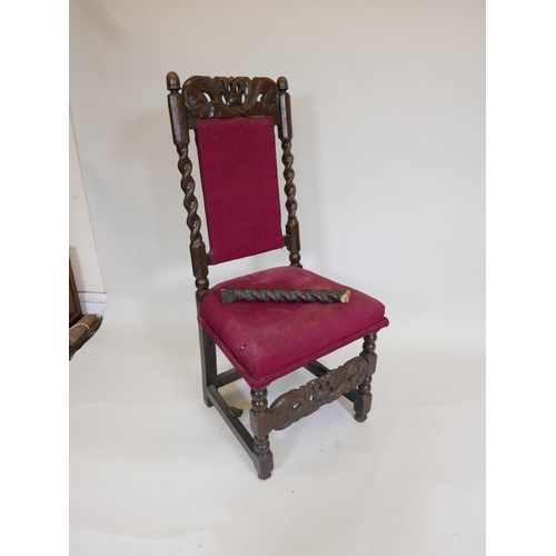 1104 - A pair of C17th/18th oak high back side chairs with carved coronets to back rail and stretcher, 44