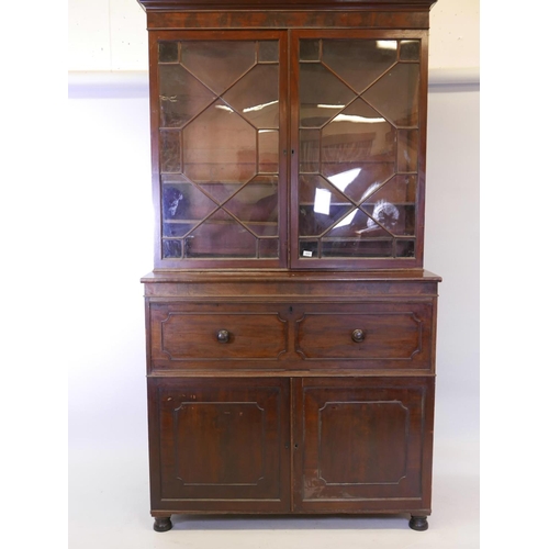 1105 - A C19th mahogany secretaire bookcase in the style of Gillow, with astragal glazed top over a fitted ... 