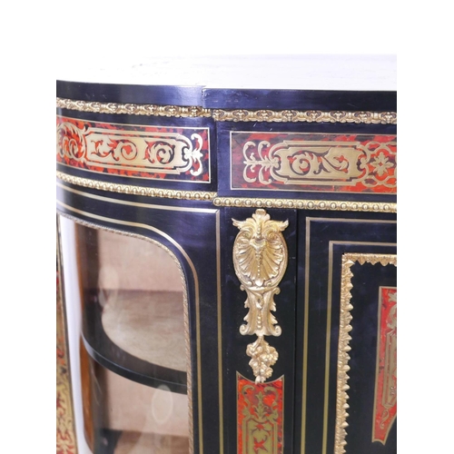 1106 - A C19th boulework and ebonised credenza, with ormolu mounts and glazed bow ends, raised on a shaped ... 