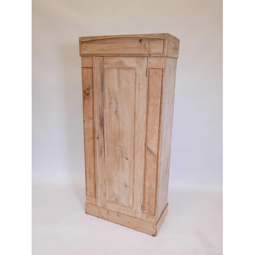 1107 - A small pine single door wardrobe, 29