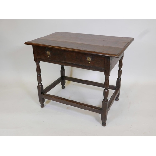 1109 - A William and Mary oak side table with a single drawer, raised on turned supports, 362 x 23