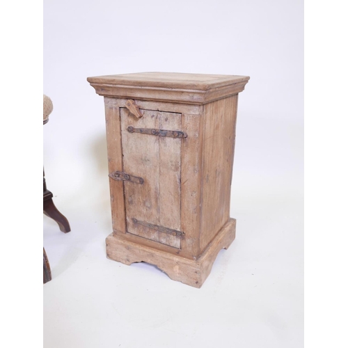 1113 - An Indian rustic teak spice cabinet, together with an Edwardian mahogany piano stool, spice cabinet ... 