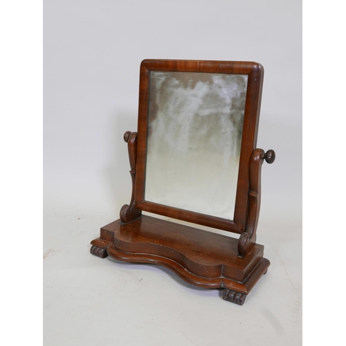 1120 - A Victorian mahogany swing toilet mirror, 19½