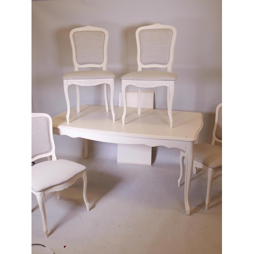 1123 - A Laura Ashley Provencale draw-leaf dining table and four matching chairs, 38