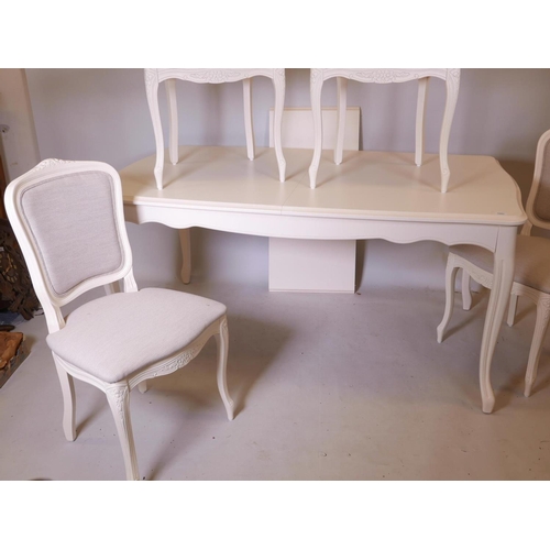 1123 - A Laura Ashley Provencale draw-leaf dining table and four matching chairs, 38