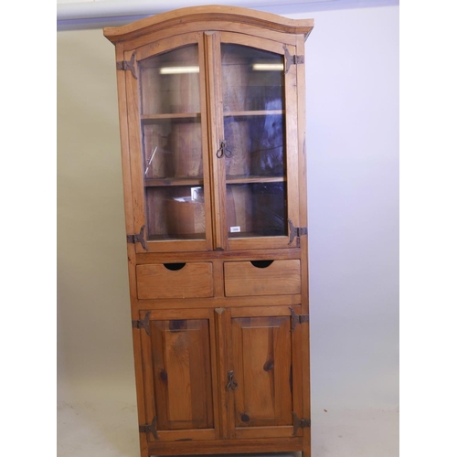 1126 - A fruitwood, arched top kitchen cupboard with two glazed doors, 31½