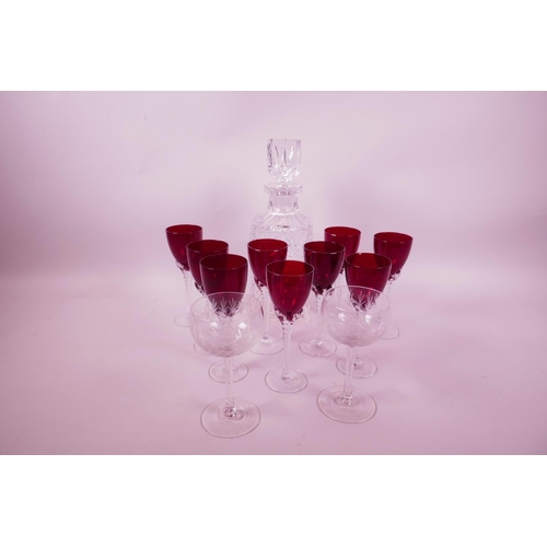 2 - A set of nine ruby wine glasses with clear twist stems, 5¾