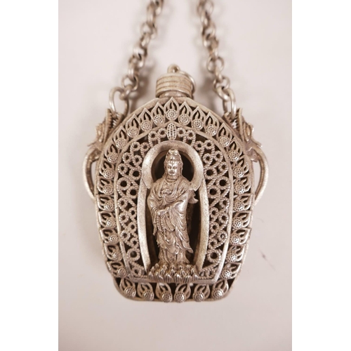 50 - A Chinese white metal filigree reticulated scent holder flask with decoration of Quan Yin, 2½