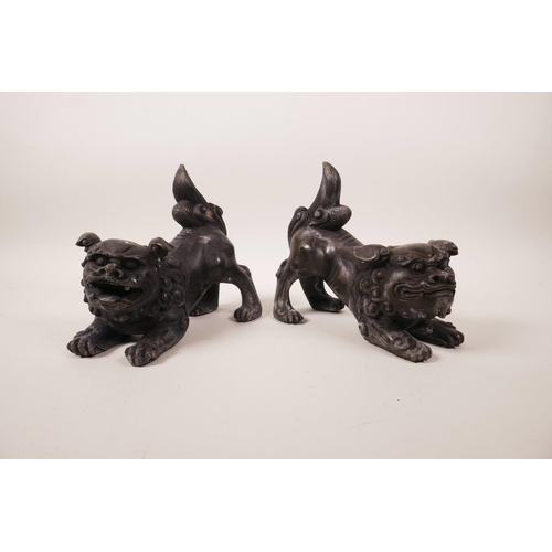 68 - A pair of Chinese bronzed metal fo dogs, 6½