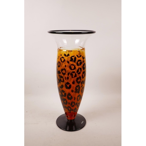 72 - A Kosta Boda art glass vase with leopard decoration designed by 'Kjell Engman', etched to base, 15