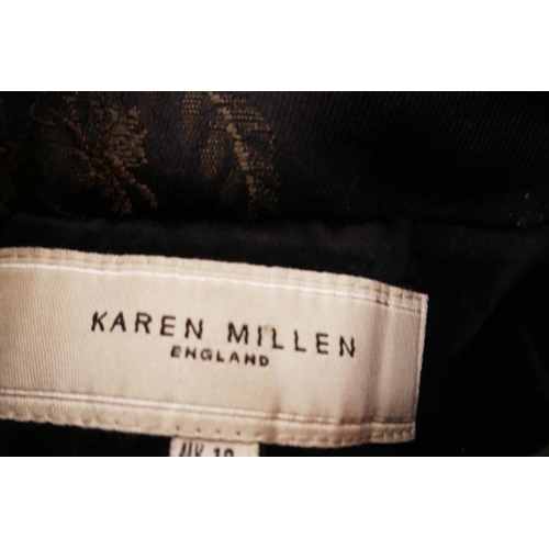 12 - A quantity of ladies' designer clothing including a Karen Millen velvet jacket