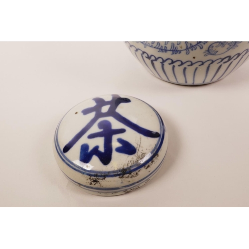 15 - A Chinese blue and white porcelain ginger jar and cover decorated with scrolling floral pattern and ... 