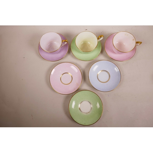 19 - A 1930s Paragon China part tea set, sponged pastel colours of pink, lilac, green and blue, with gilt... 