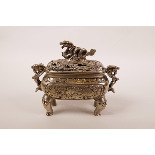 30 - A Chinese silvered metal two handled censer with a pierced lid and dragon decoration, 6 character ma... 