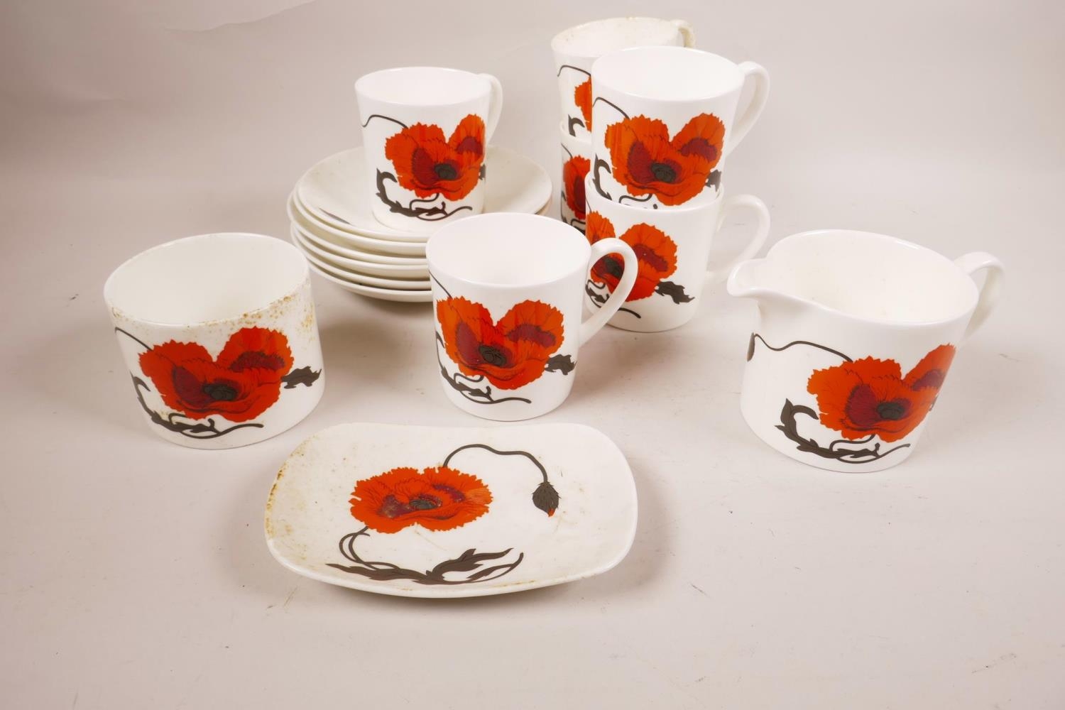 A Wedgwood Susie Cooper 'Corn Poppy' design part tea service in bone china,  six teacups, six tea sau