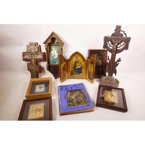 57 - A collection of ten religious artefacts, including six Madonna and Child icons, three of Christ on t... 