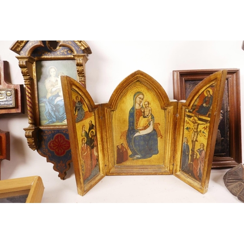 57 - A collection of ten religious artefacts, including six Madonna and Child icons, three of Christ on t... 