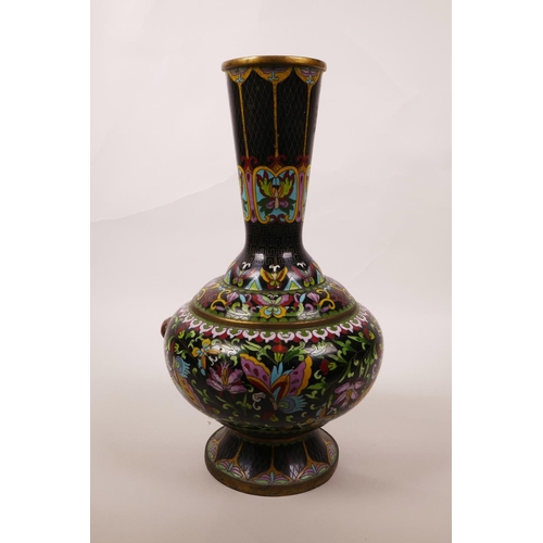 6 - A Chinese black ground cloisonné vase, decorated with butterflies and lotus flowers, A/F repair, 12