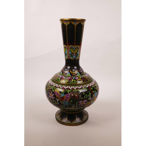 6 - A Chinese black ground cloisonné vase, decorated with butterflies and lotus flowers, A/F repair, 12