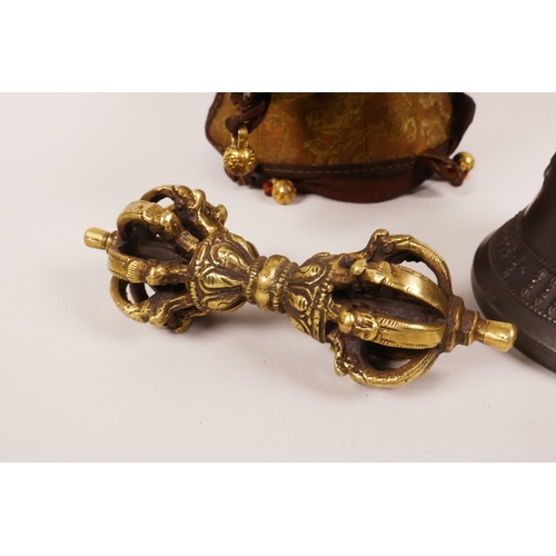 60 - A Sino-Tibetan bell with a brass handle in the form of a vajra, together with a brass ceremonial vaj... 