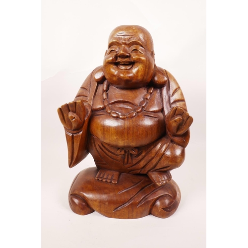 66 - A carved wood figure of Buddha, 12½