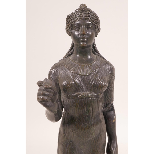 42 - A cast bronze figurine of a classical maiden, 10½