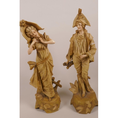 43 - A pair of Austrian Amphora figurines of a courting couple, marked EW. Turn Wien Austria, 13