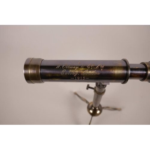 56 - A brass reproduction desktop telescope on stand, 9½