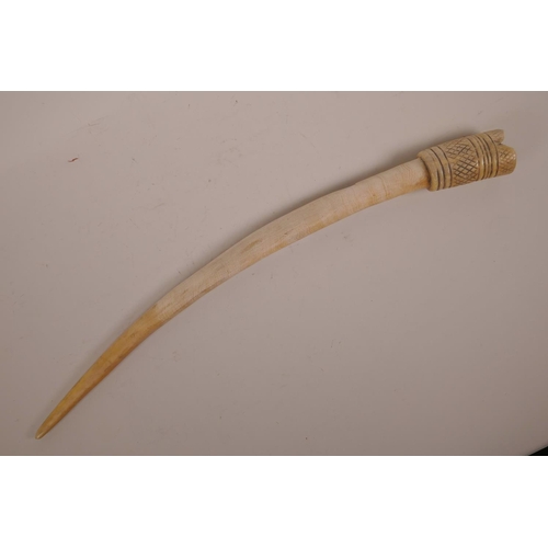 63 - A C19th African hunter's ivory oliphant, 21½