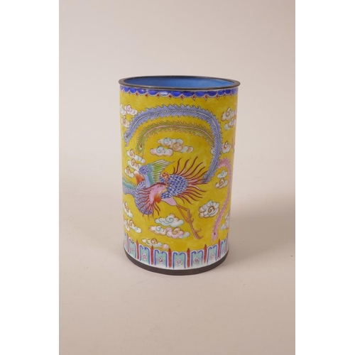 10 - A Canton enamel brush pot with dragon and phoenix decoration, 4 character mark to base, 5