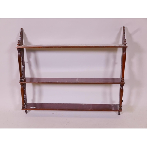 1170 - A C19th mahogany open hanging shelf with open sides, 30