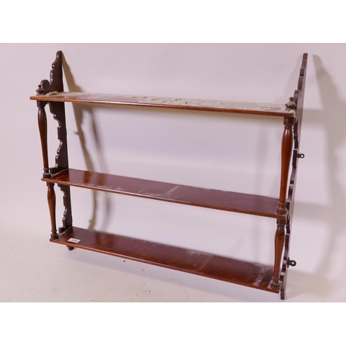 1170 - A C19th mahogany open hanging shelf with open sides, 30