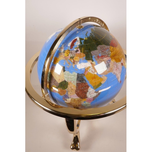 14 - A composition and specimen stone terrestrial globe, 19½