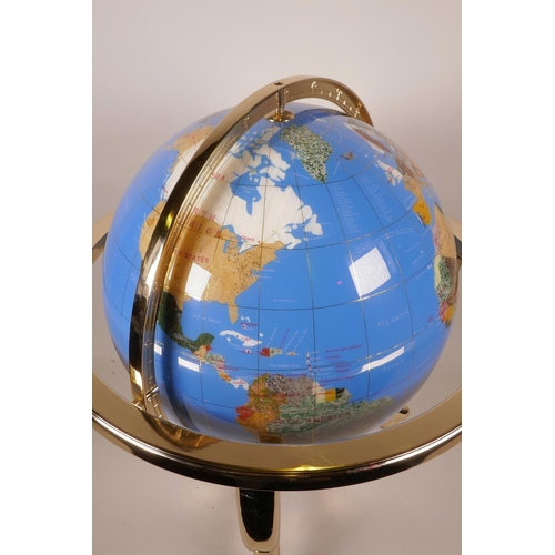 14 - A composition and specimen stone terrestrial globe, 19½