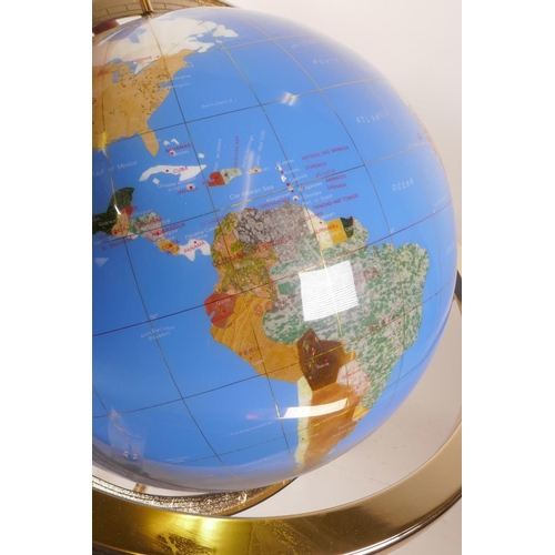 14 - A composition and specimen stone terrestrial globe, 19½