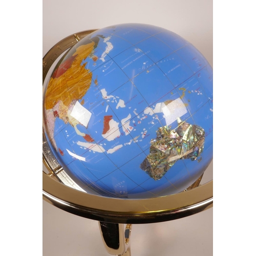 14 - A composition and specimen stone terrestrial globe, 19½