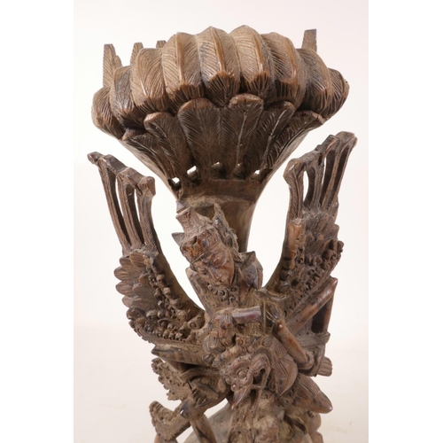 16 - A 1940s Balinese hard wood carving of Vishnu riding Garuda, beautifully carved, A/F, 15