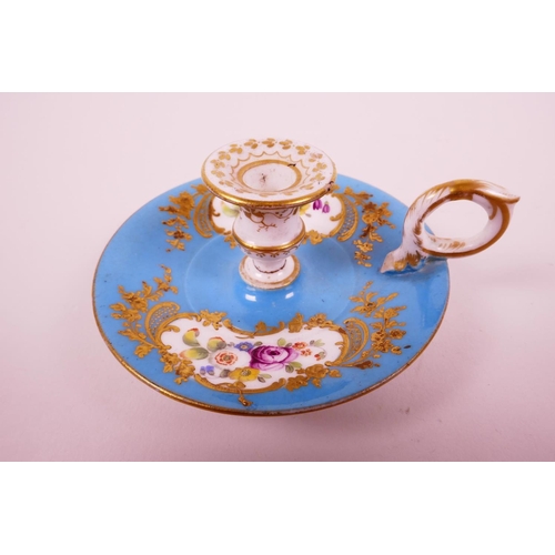 22 - A C18th Sevres bleu celeste (turquoise blue) ground chamberstick, hand painted with polychrome flowe... 